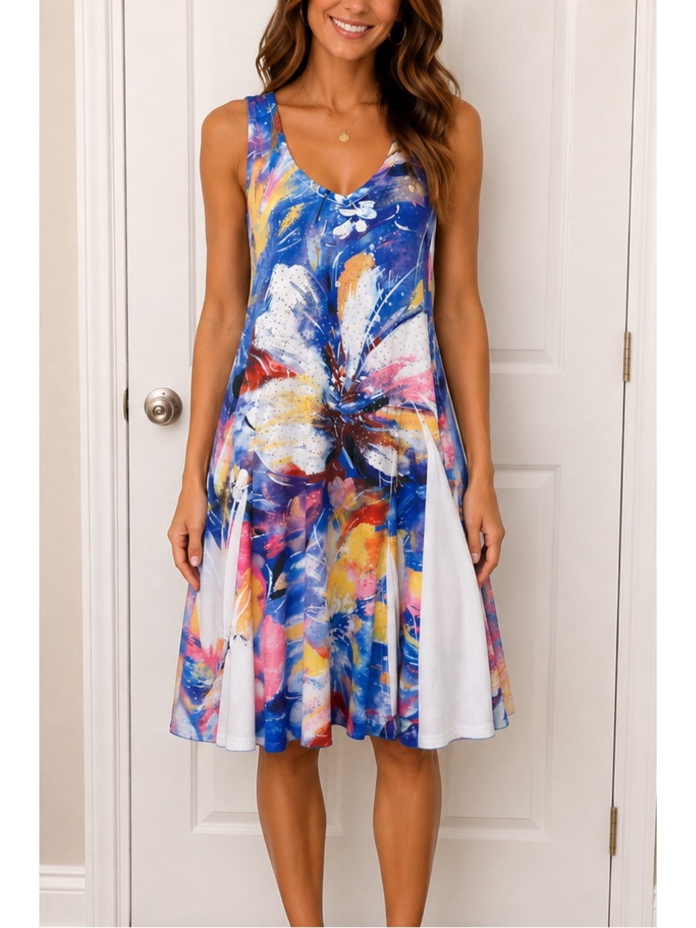 India Boutique colorful, and flowy dress featuring an abstract floral pattern
